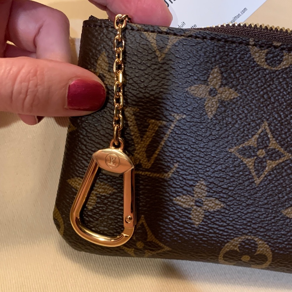Louis Vuitton Brown and Tan Monogram little wallet,Clutch, key holder. Must have